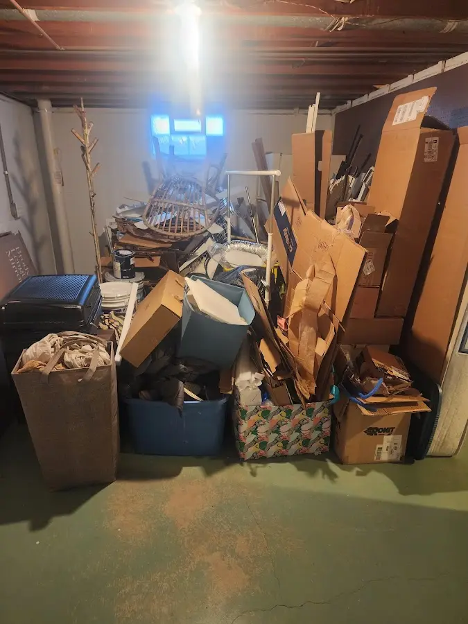 Roll-off dumpster container at job site for 15 Yard Dumpster Rental in Fuller Heights